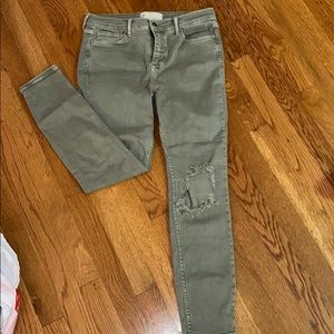 Mid rise olive green jeans w/ rips on knees